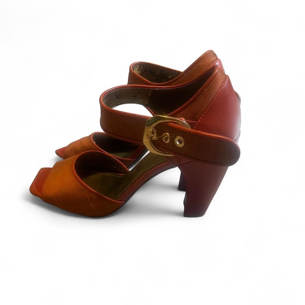Paleo orange leather heels with gold buckle
